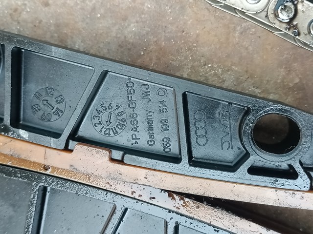 Успокоитель цепи ГРМ, левый 059109514C VAG