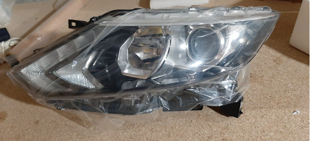 Основная фара в сборе левая 260604EH1A NISSAN
