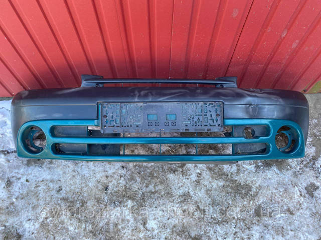 Кожух бампера переднего 7700307057 RENAULT