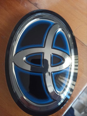 Фирменный значек решетки радиатора 9097502161 TOYOTA