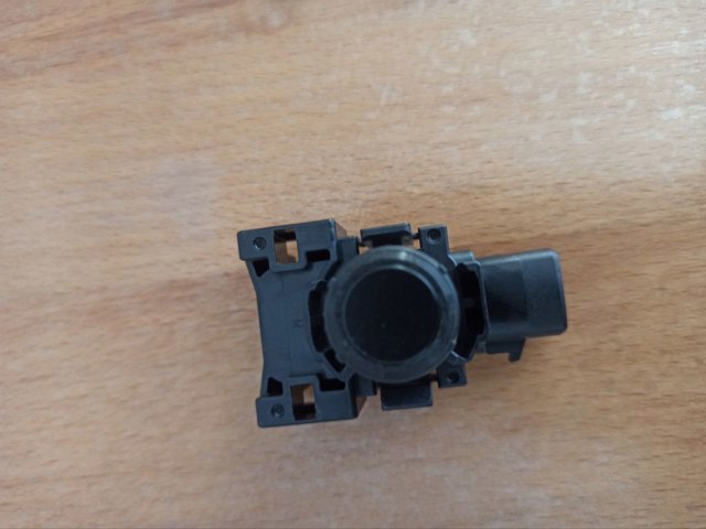 Датчик парктроника центральный KD4767UC1 MAZDA