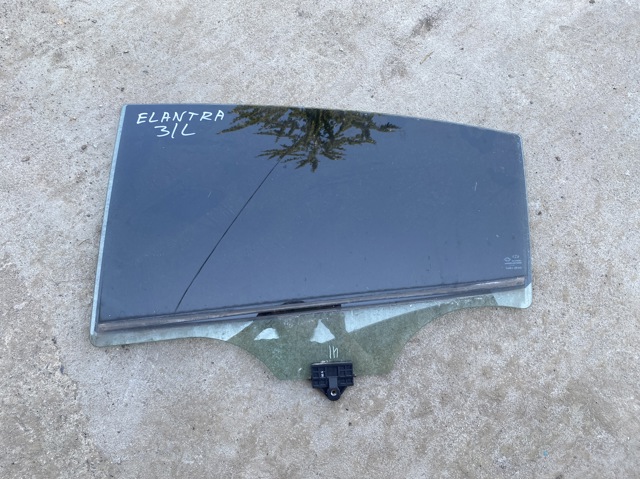 Стекло задней двери, левой 83410F2020 HYUNDAI