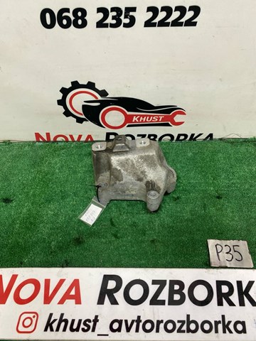 Кронштейн подушки (опоры) двигателя, левой 1K0199117AJ VAG