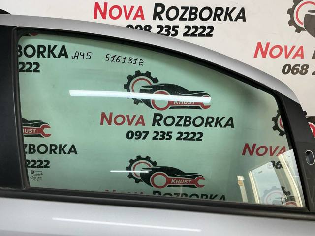 Стекло пассажирской двери 5161312 OPEL