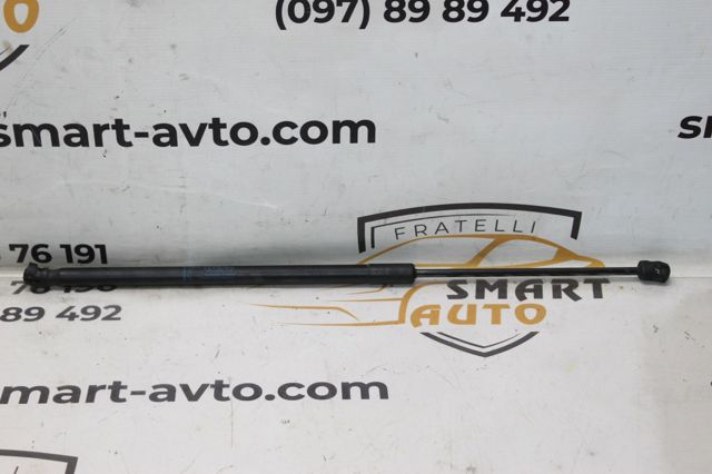Амортизатор задней двери Opel Astra J