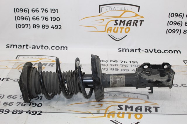 Амортизаторная стойка передняя левая 39039573 GM