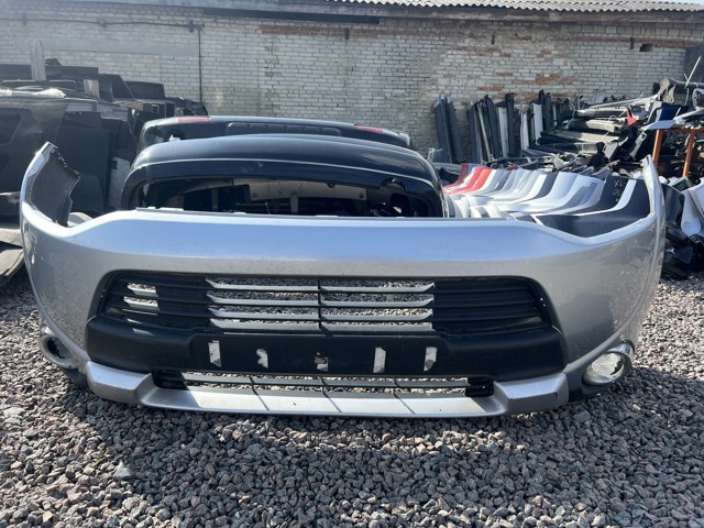 Передний бампер 6400G280 MITSUBISHI