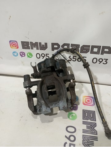 Суппорт тормозной левый задний 34206883033 BMW