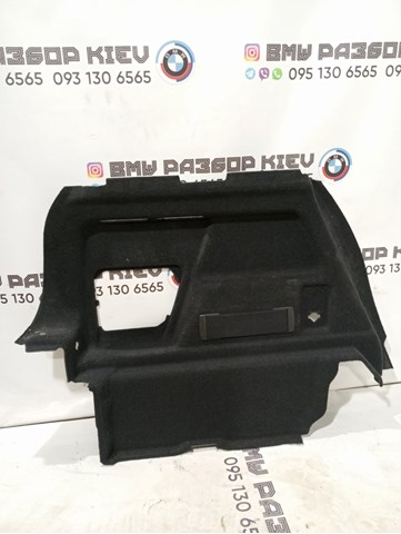 Облицовка багажного отсека, левая 51477423243 BMW