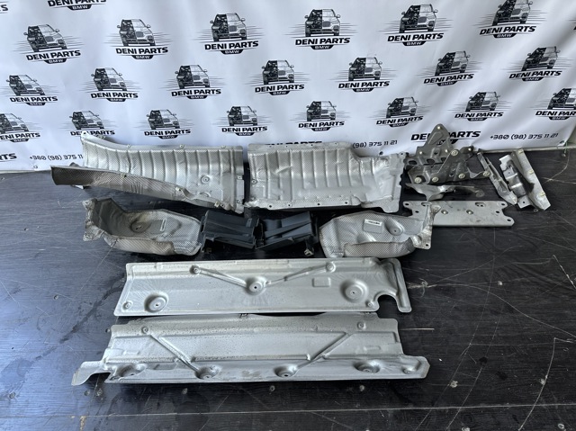 Защита выхлопа 51487424938 BMW