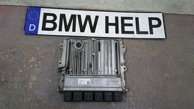 Электронный блок управления двигателем 12148693213 BMW