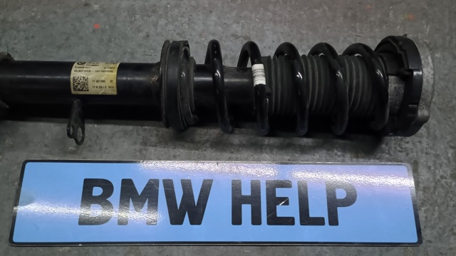 Амортизатор передний левый 31316871995 BMW