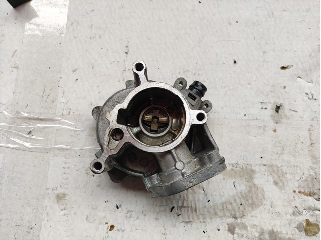 Насос вакуумный 06K145100B VAG