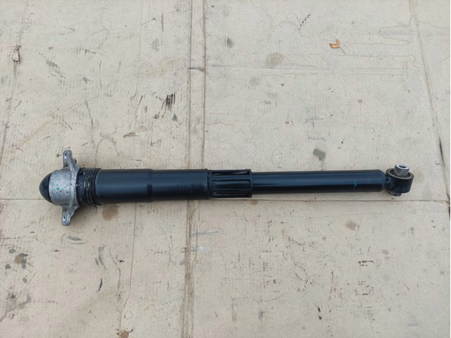Стойка амортизатора задняя 5QN513049AQ VAG