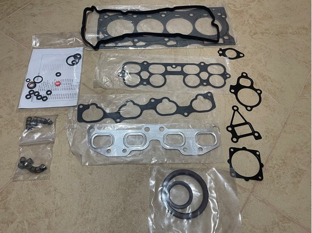 Комплект прокладок на двигатель 101018J085 NISSAN