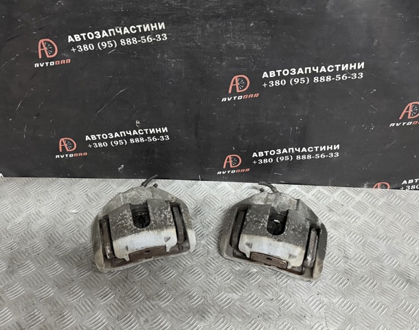 Суппорт тормозной, передний, правый 34116753660 BMW