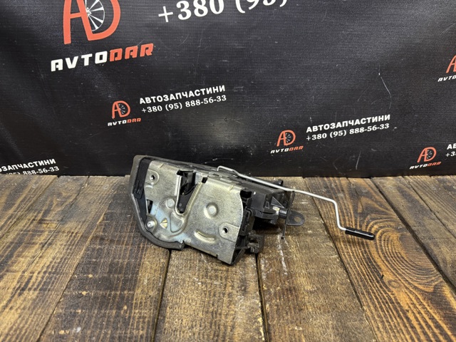 Замок двери водителя 7059973 BMW
