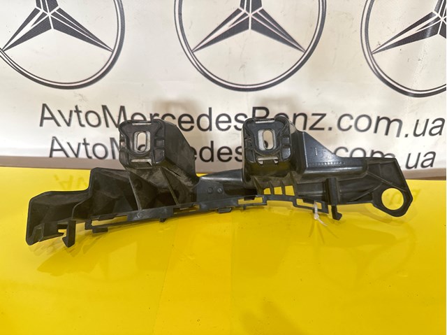 Левый кронштейн заднего бампера A2058850365 MERCEDES