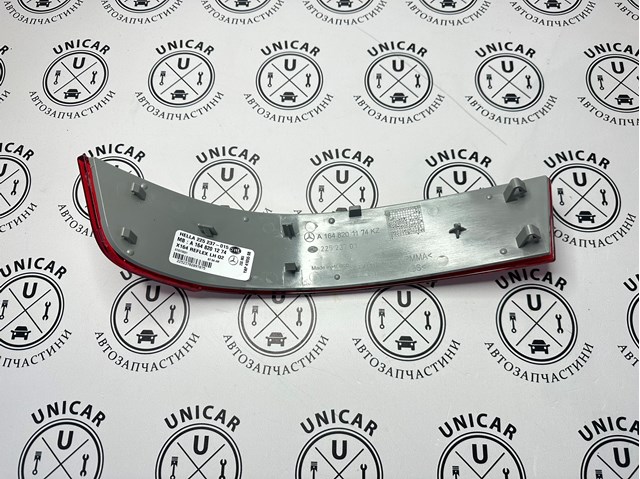 Левый отражатель бампера A164820117439 MERCEDES