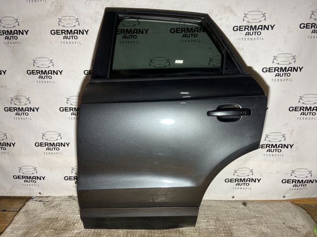 Дверь пассажирская задняя левая 8U0833051B VAG