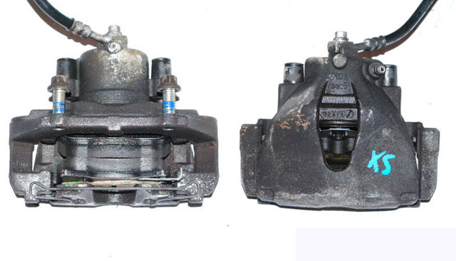 Суппорт тормозной, передний, левый 0542471 OPEL