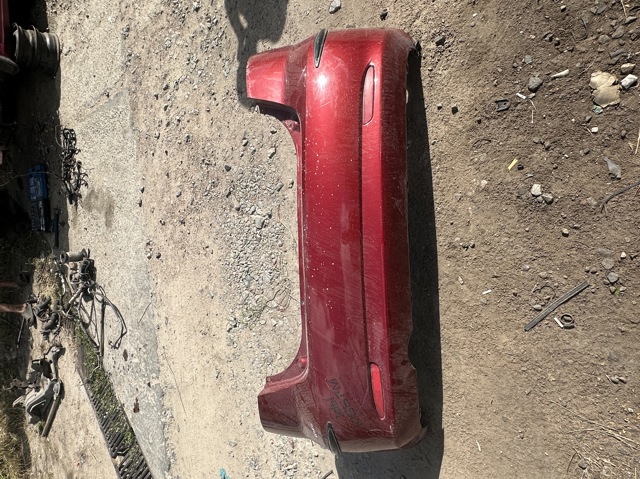 Задний бампер 96545561 GM
