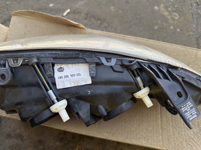Вставка фары правой 1AG006920221 HELLA