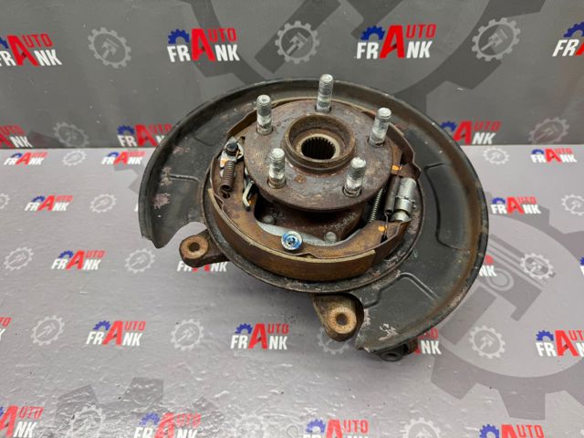 28411SC000 Цапфа (поворотный кулак) задний правый купить Сумы