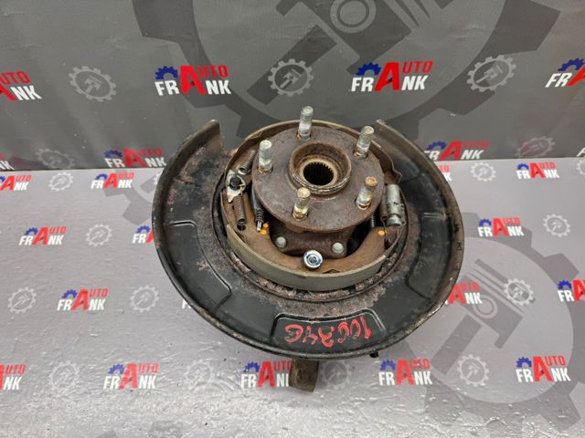 28411SC010 SUBARU Цапфа (поворотный кулак) задний левый купить в Ирпень