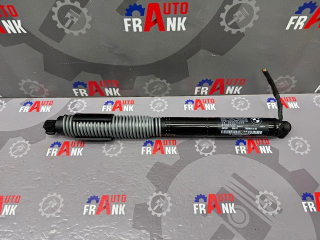 Амортизатор крышки багажника 51244A1FA90 BMW
