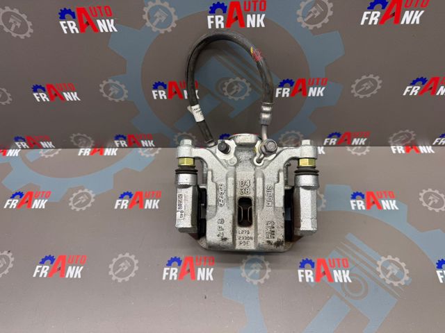 Тормозной суппорт задний левый 58210G4500 HYUNDAI