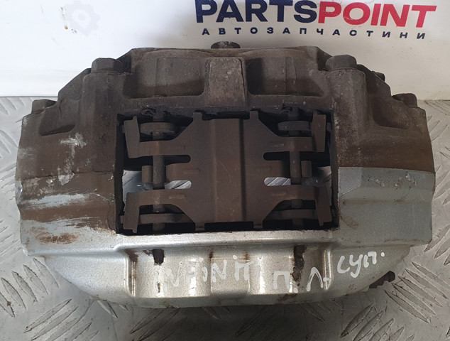 NISSAN 41011JL02A Суппорт тормозной передний левый в наличии Кривой Рог