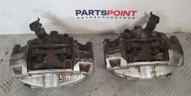 Задний левый суппорт 44011JL02A NISSAN