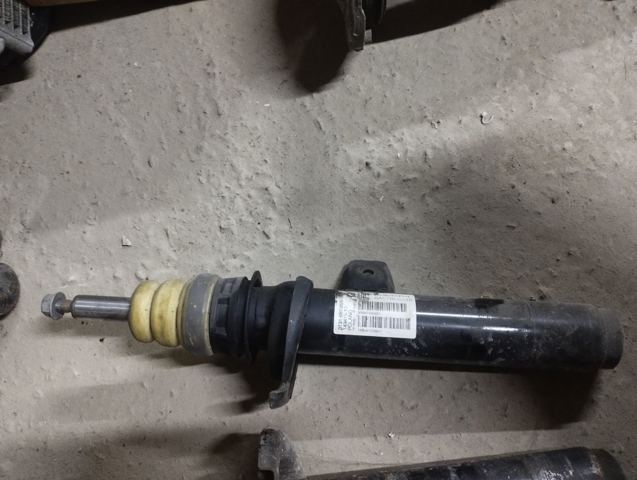 Передний правый амортизатор 31316873828 BMW