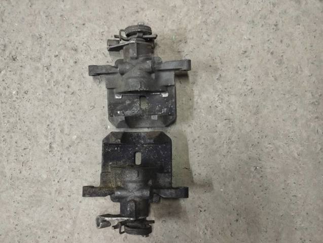 Суппорт тормозной левый задний FR3Z2553G FORD
