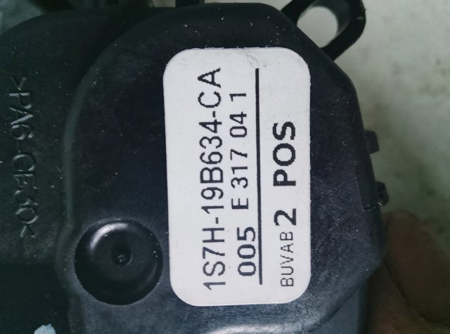 Двигун заслінки печі