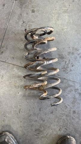 Пружина задняя