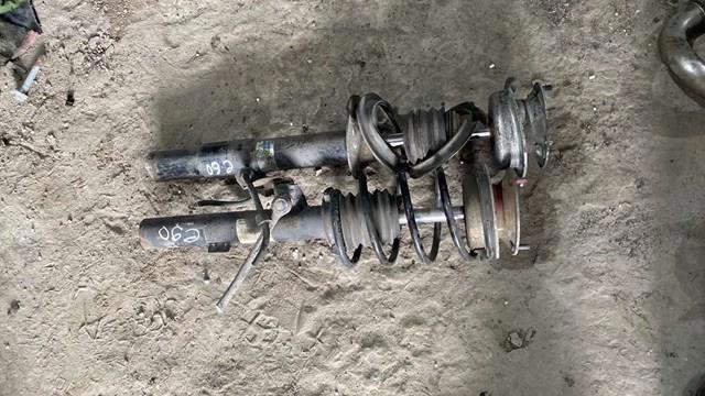 Амортизатор передний левый