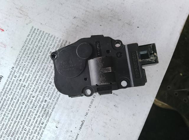 Двигун заслінки печі