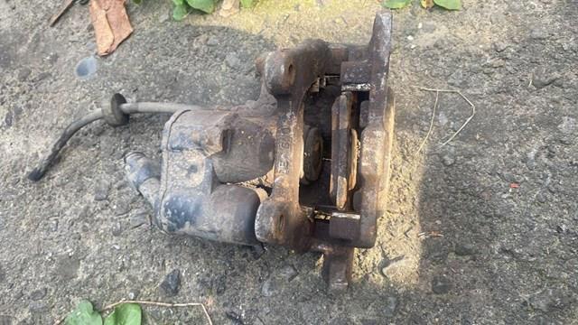 Суппорт тормозной задний левый — фото 2