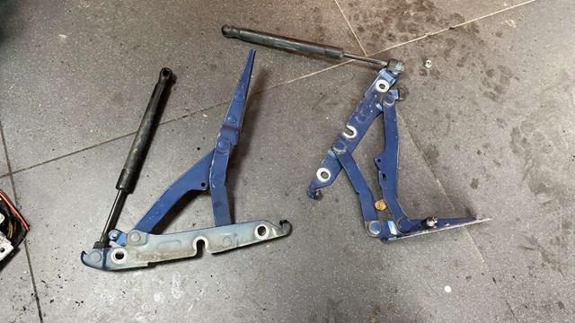 петля кришки багажника