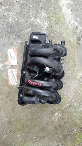 Колектор впускний