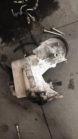 Радиатор масляный (холодильник), под фильтром — фото 3