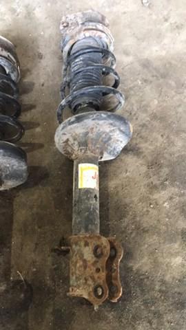Амортизатор задний левый — фото 2