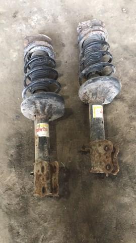 Амортизатор задний левый