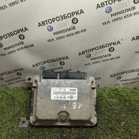 Электронный блок управления двигателем 06A906018CG VAG