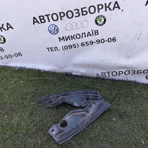 Левый кронштейн переднего бампера 1T0807889A VAG