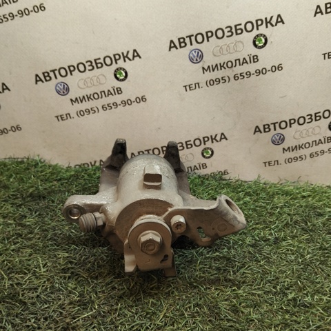 Задний правый суппорт 6R0615424 VAG