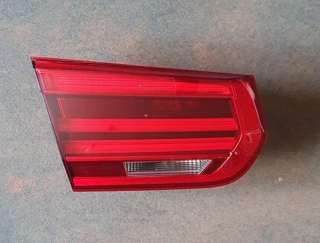 Фонарь задний левый, внутренний 63217369121 BMW
