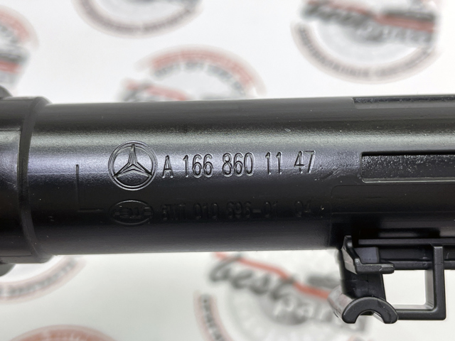 1668601147 MERCEDES Держатель форсунки омывателя фары (подъемный цилиндр) купить в Сумы